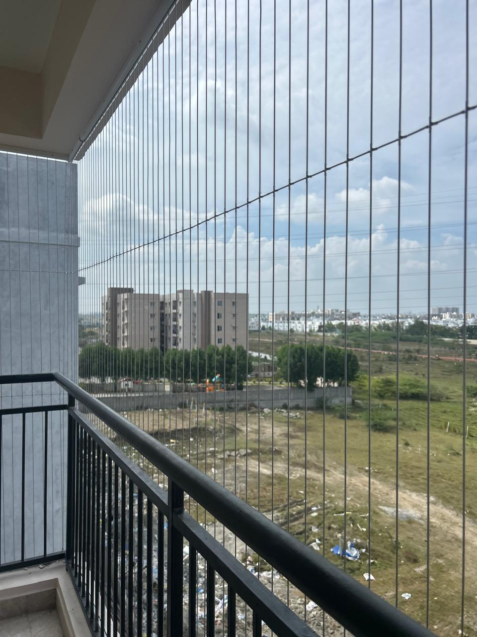 Invisible grill installation in Chennai - modern balcony safety